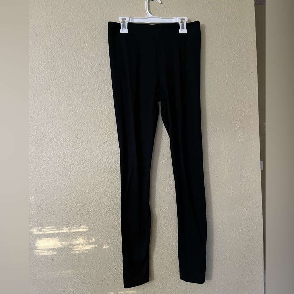 Two pair of black leggings